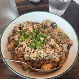 Old Thousand signature dishes General Tso's Chicken, Brisket Fried Rice, Jalapeño Popper Rangoons, Mala Fried Chicken. 